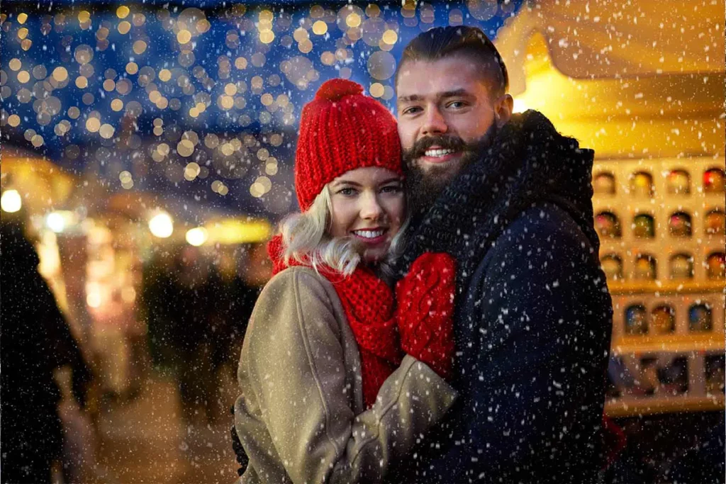 smiling couple in the snow